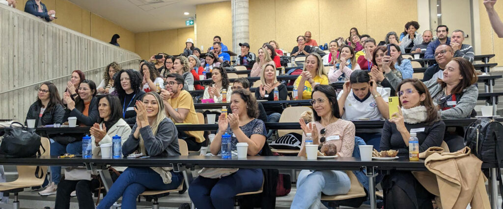 A lecture room full of attendees of the CAPES program